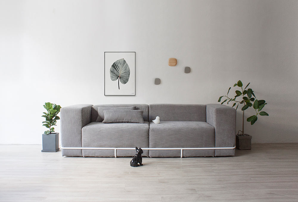 A Minimalist Sofa Held Together with a Frame
