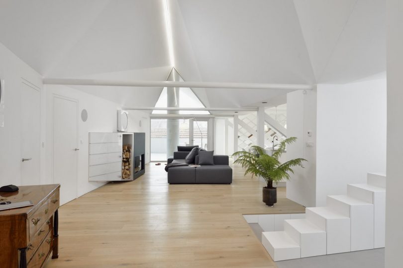 An Attic Apartment in Slovenia with a Faceted, Geometric Ceiling