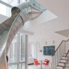 An NYC Home with a Steel Slide by Turett Collaborative Architects