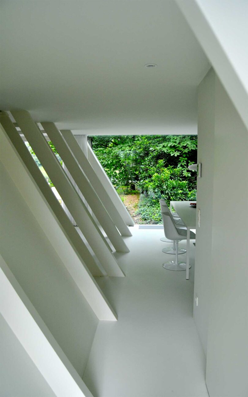 interior walkway on edge of modern a-frame house