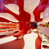 Curvy Red and White Camper Shoe Store Renovation by A-cero