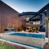 Sculptural Steel Walls and Infinity Pool: “House The” by Nico van der Meulen Architects