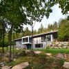 Wood-Covered Home in the Woods by Blouin Tardif Architecture