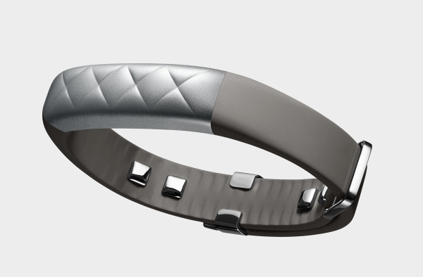 "An innovative adjustable clasp had to be invented to allow for the sensor data to travel around the wrist and strap. The clasp mechanism allows the band to slide through a flat metal gate and lock in at just the right size for the user. This maximizes the exposure of the sensors on your skin." - Yves Behar