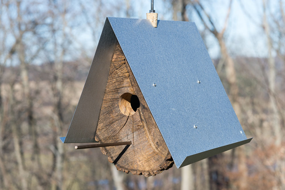 Log Quartered Birdhouses by Moger Mehrhof Architects