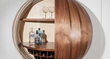 A Wall-Mounted Bar Cabinet Inspired by a Spinning Coin