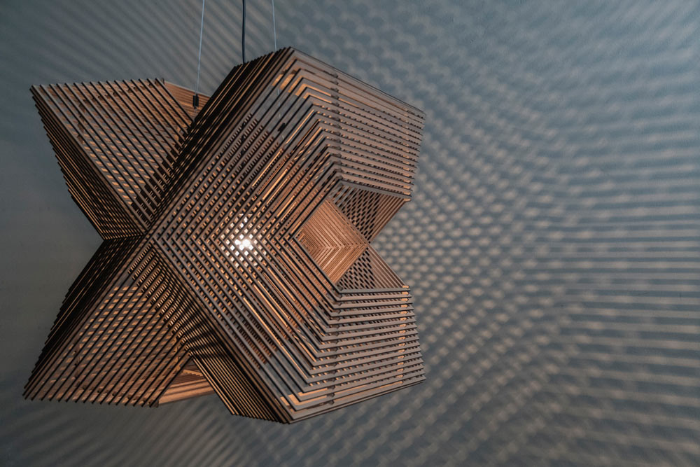 Pendant Lamp Made Up Of Laser Cut Rectangles - DigsDigs