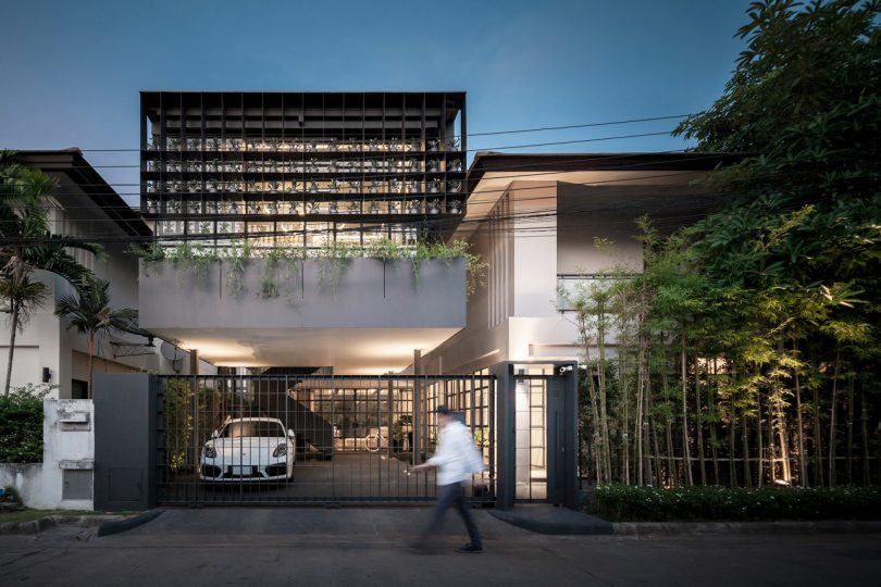 A Bangkok House with a Steel Facade Filled with Plants by Anonym