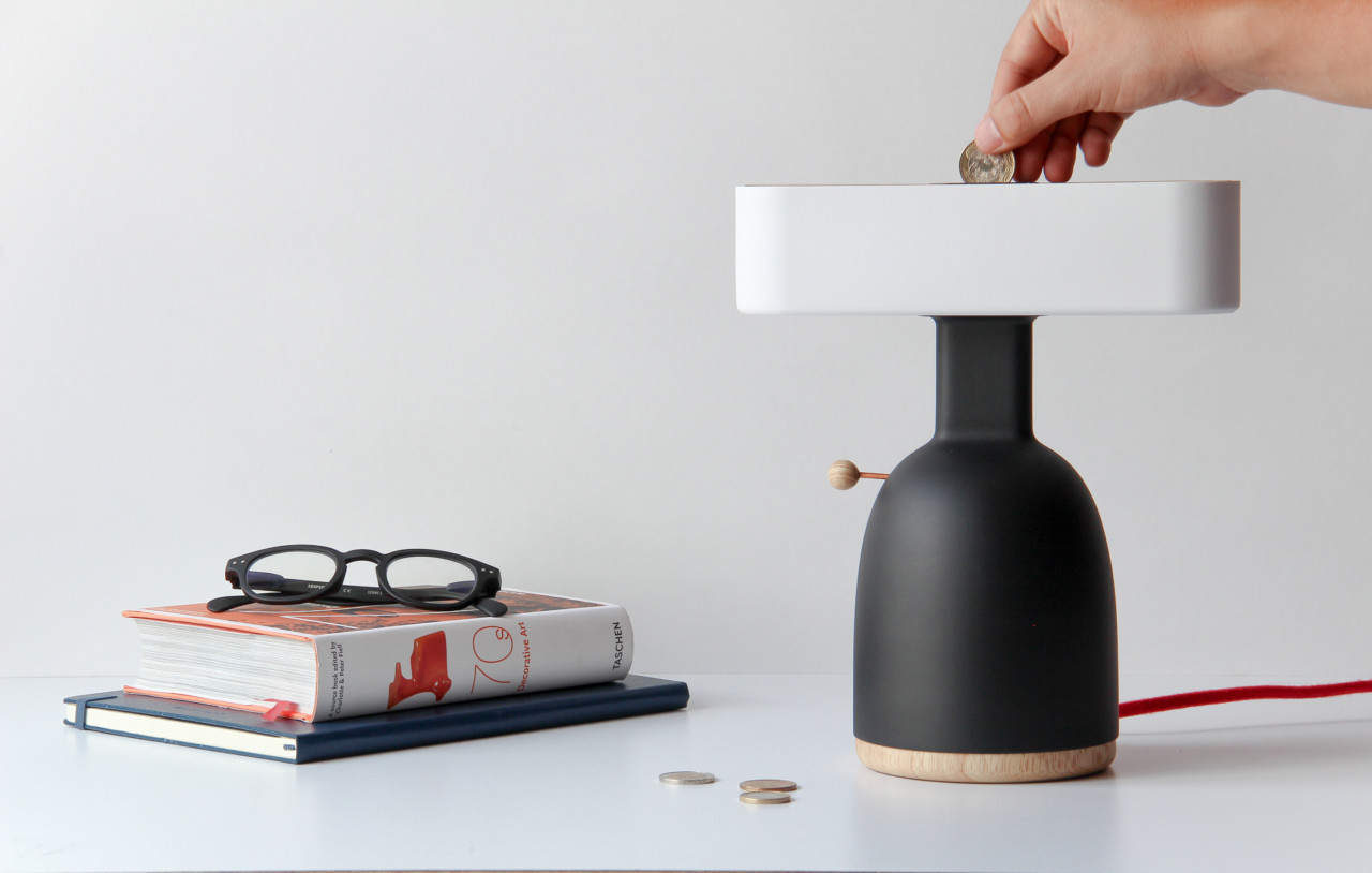 The Dina Is One Part Lamp, One Part Piggybank