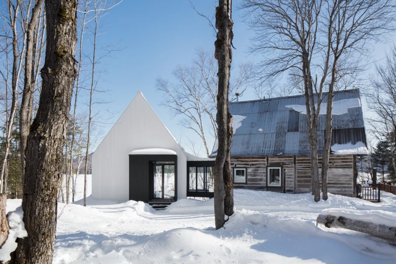 ACDF Architecture Designs a Modern, Prism-Like Addition for Traditional House in Canada