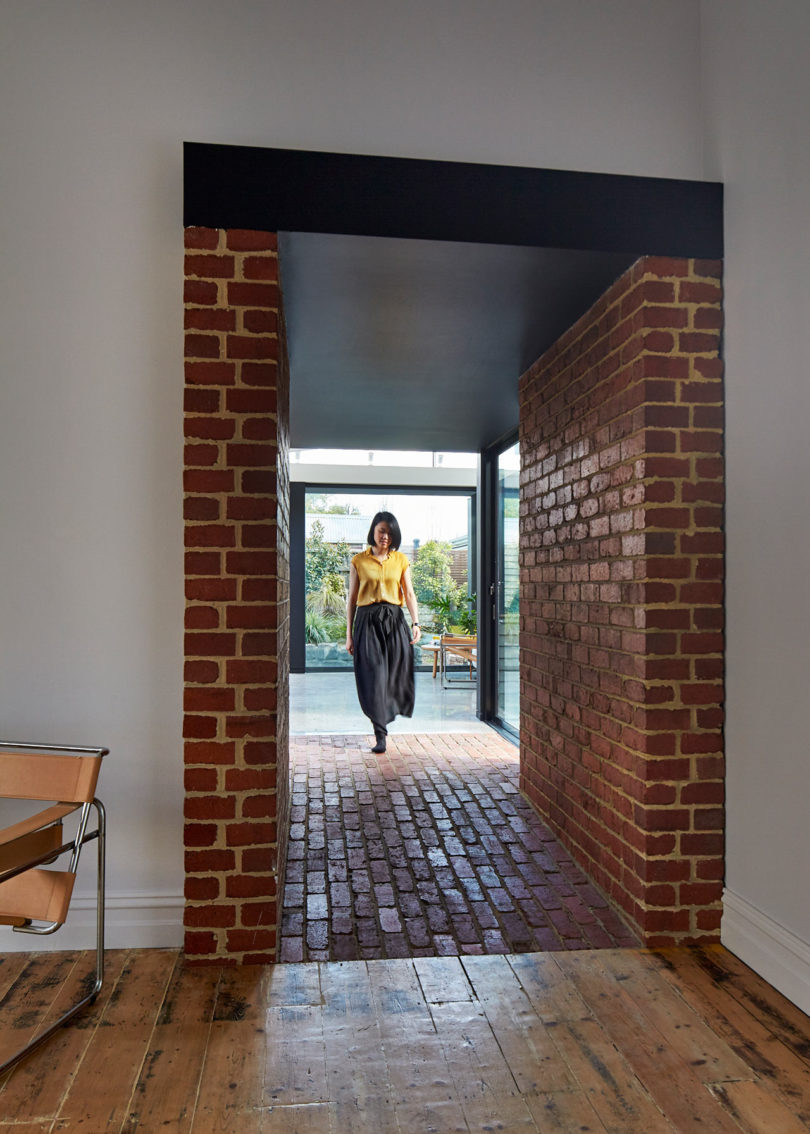 A Cottage Renovation Leads to a New Addition Accessed Through a Tunnel