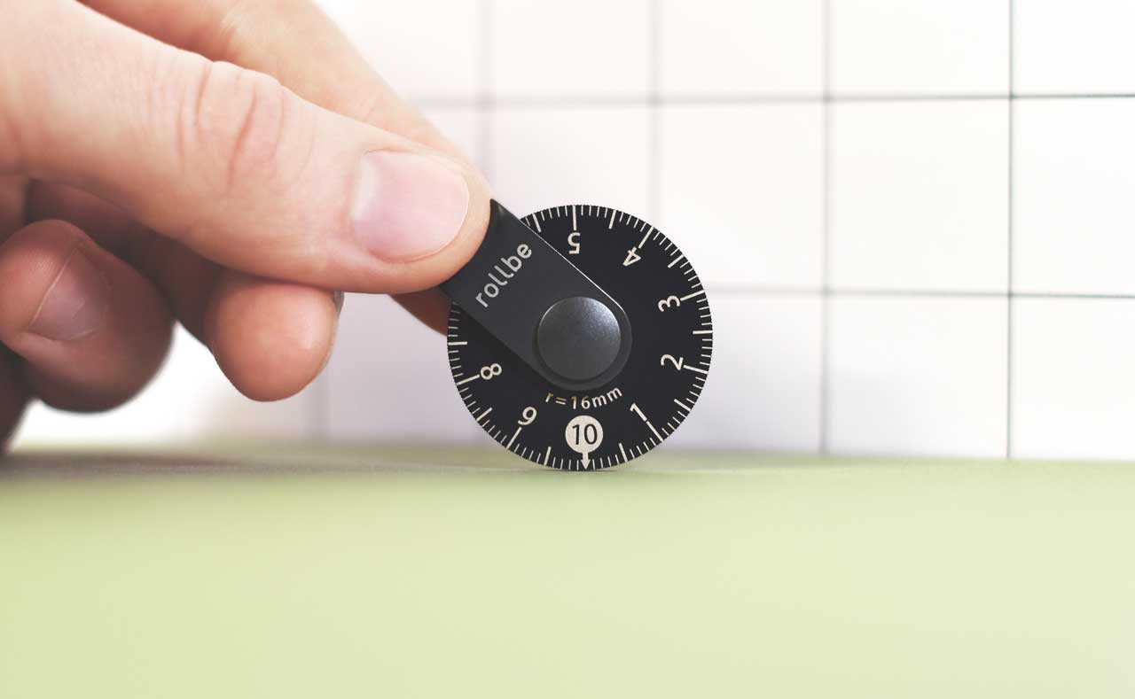 Rollbe Click Is a Super Compact, Coin-Sized Rolling Ruler
