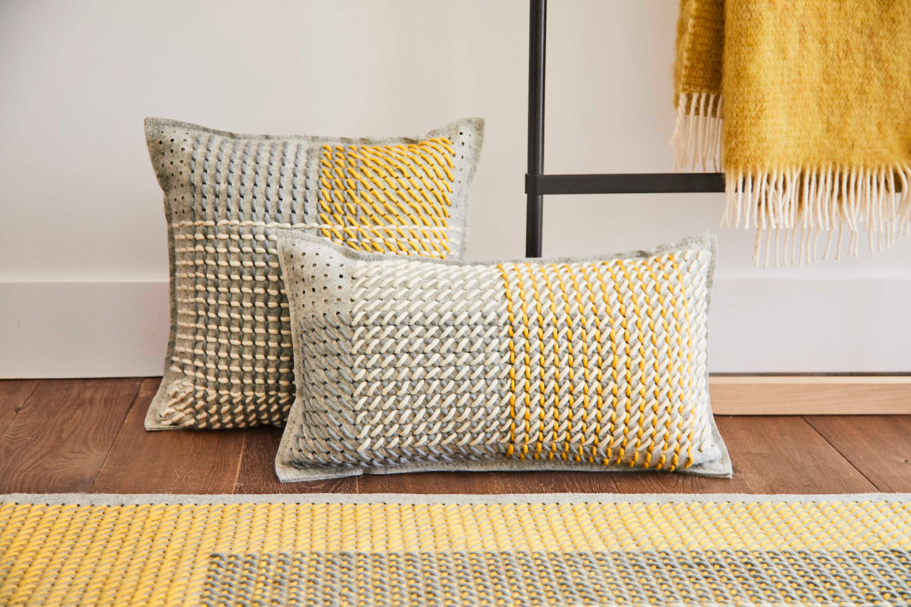 CANEVAS GEO Adds Oversized Cross-Stitching to Rugs and Pillows