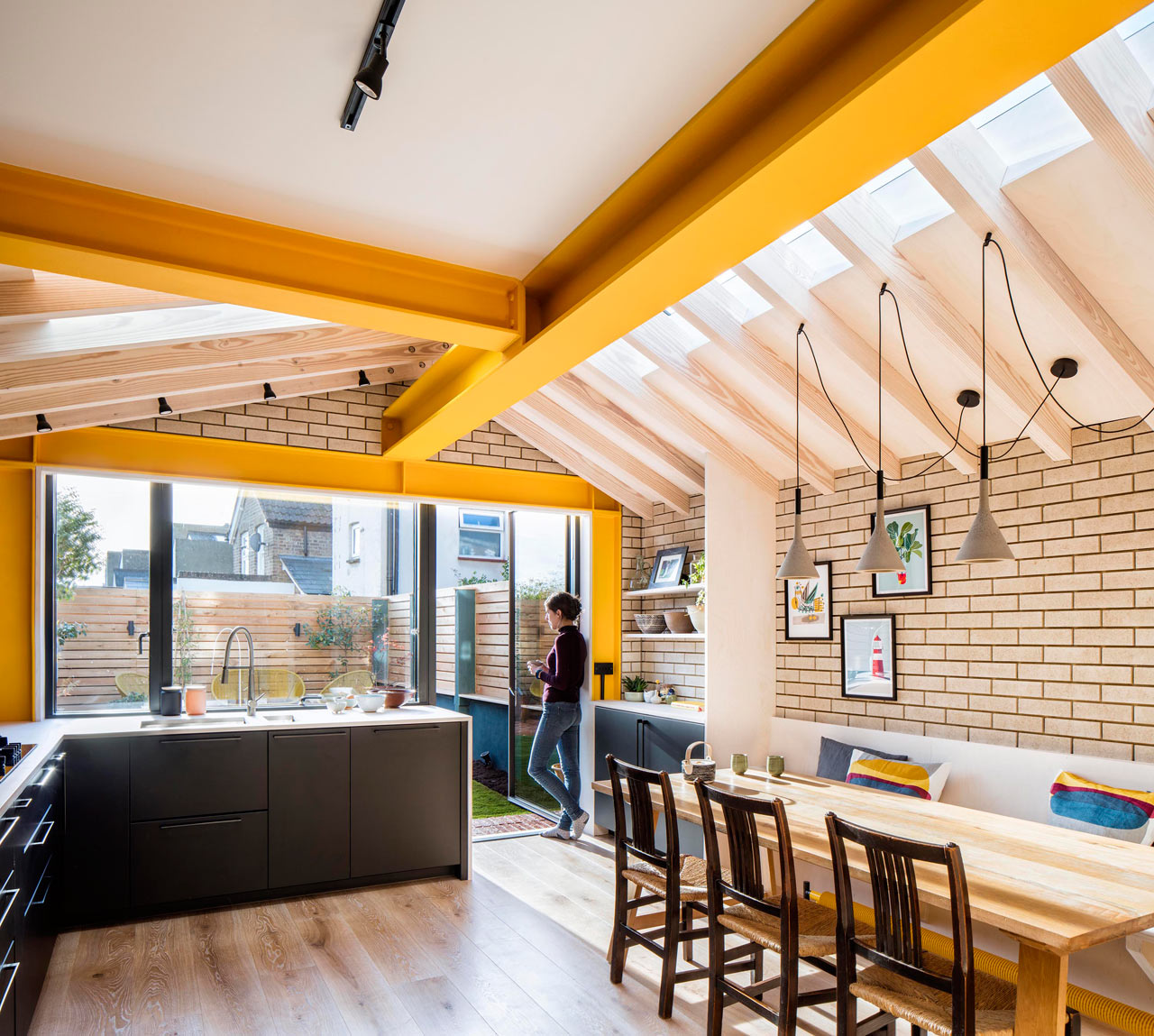 London’s Yellow Steel House Is a Colorful Extension to a Terraced House
