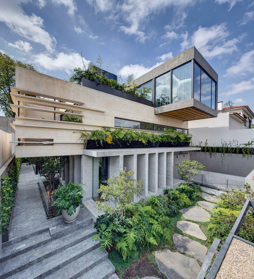 A Concrete House in Mexico City Surrounded by Gardens