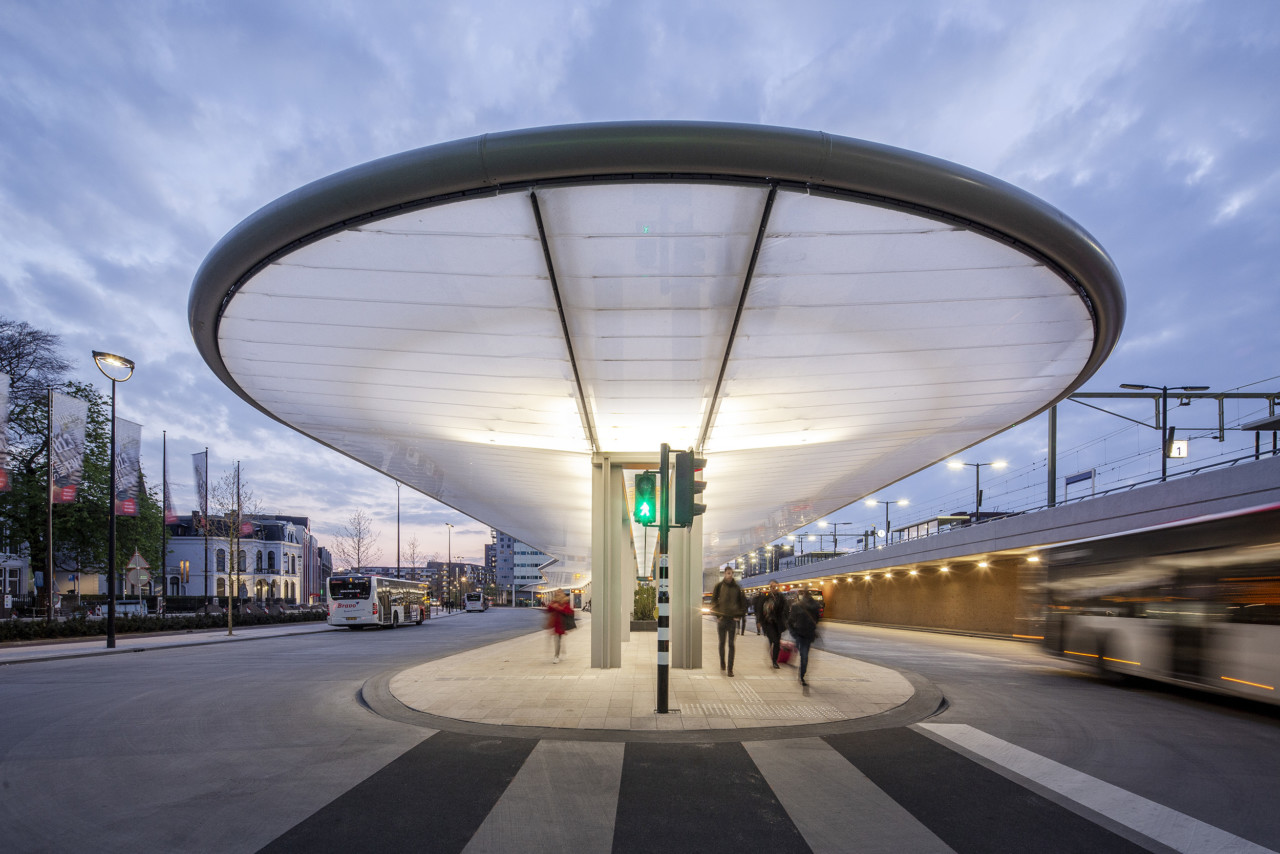 A Bus Station Awning by Day, Solar Powered Lighting Element at Night