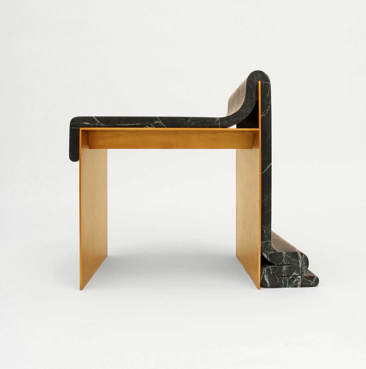A Marble and Brass Chair That Looks as If It's Melting