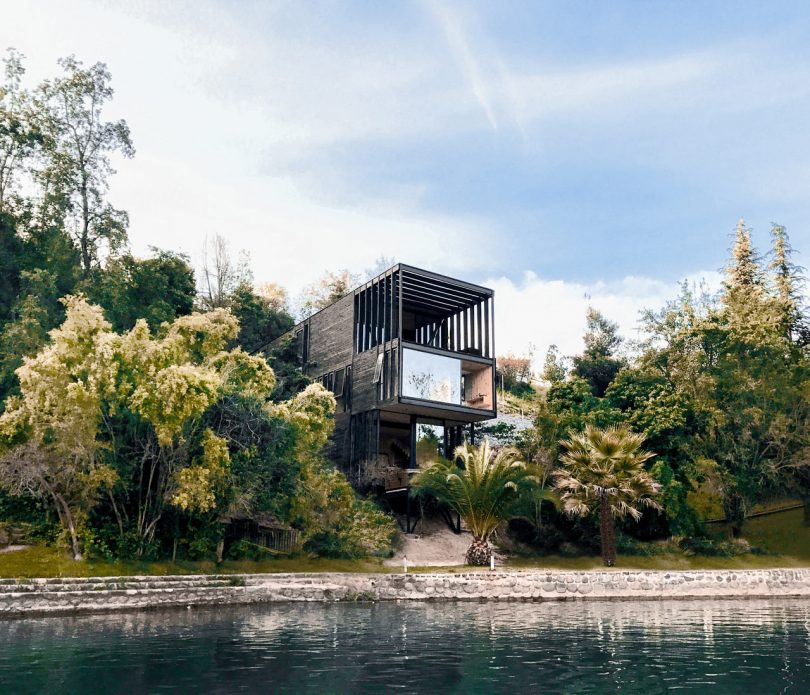 Slope House Resides on the Hillside of Lake Rapel in Chile