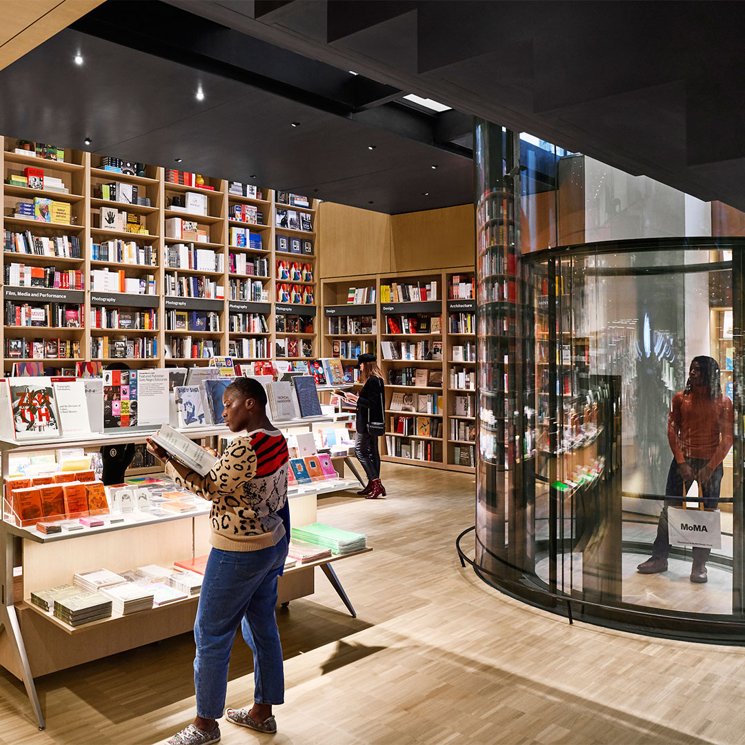 Drik vand dyd Bliver værre New MoMA Flagship Store Boasts a Two-Story Bookshelf with 2,000 Books