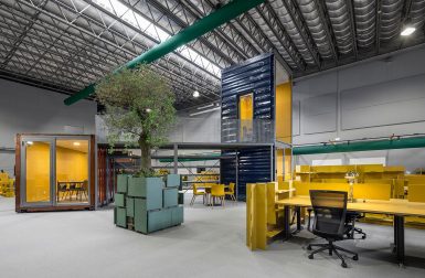 A Warehouse Is Transformed with Shipping Containers into Innovative Office
