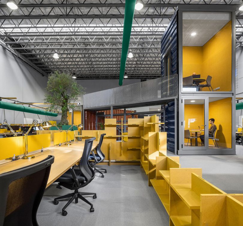 A Warehouse Is Transformed with Shipping Containers into Innovative Office