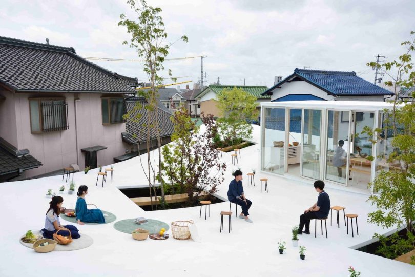 An Office in Japan with a Curved Floating Rooftop to Hang out On