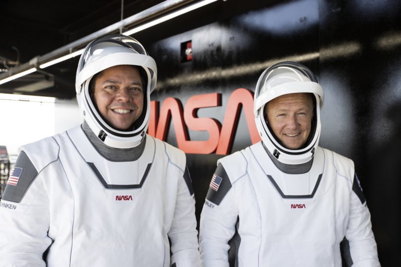 Two men wearing the SpaceX Spacesuit Design