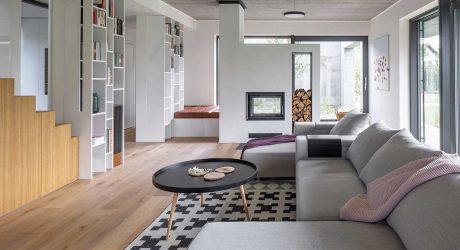 A Family Home in Prague With Concrete, Wood, + Playful Details