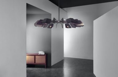 Fin Chandelier: A Low Profile Fixture with Geometric Reflectors for Precise Lighting