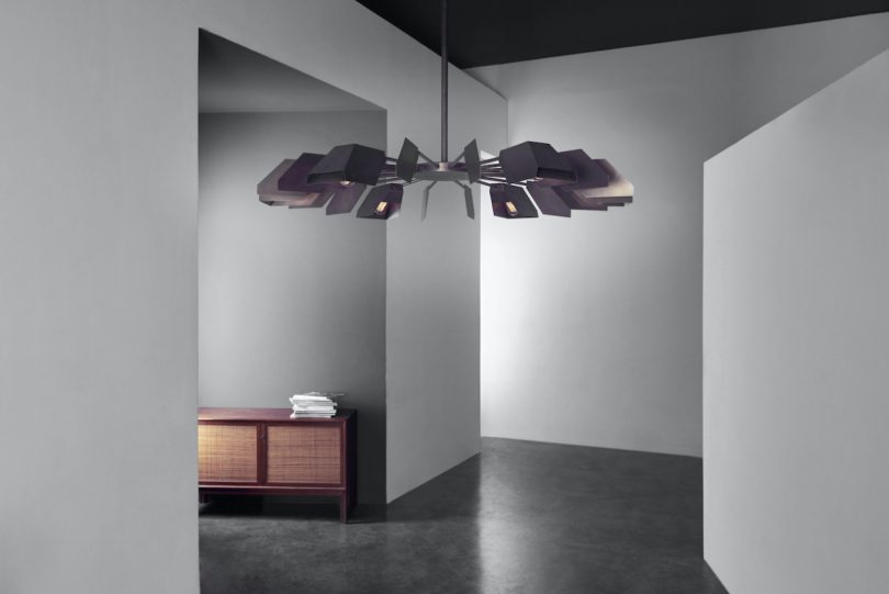 Fin Chandelier: A Low Profile Fixture with Geometric Reflectors for Precise Lighting