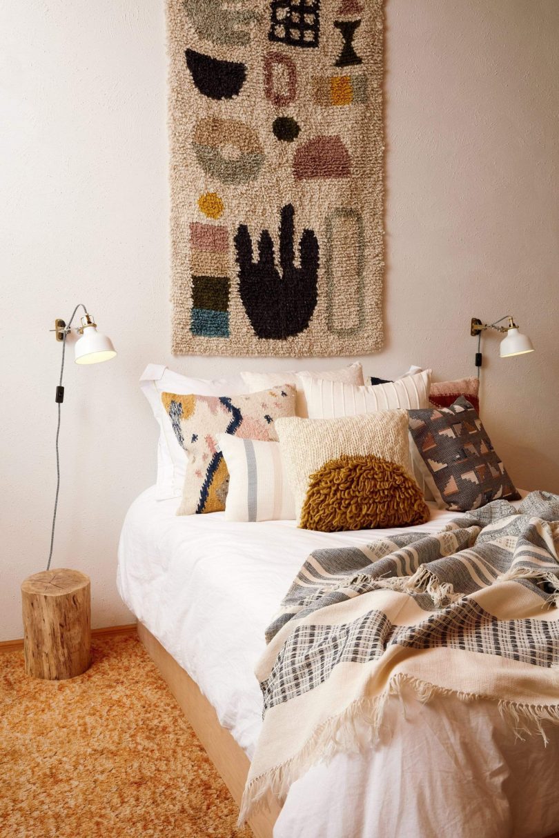 A rug hanging on a wall as decor