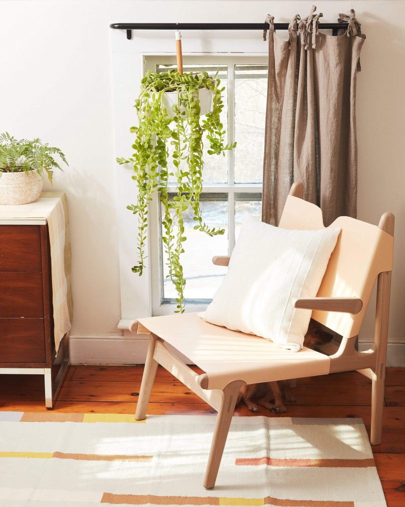 One of Minna Good's Ethical Wool Rugs under a chair