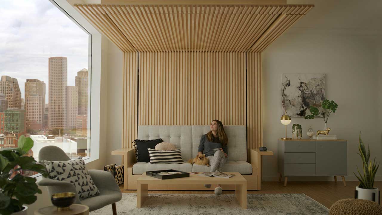 A Sofa That Transforms To a Bed by Lowering From the Ceiling