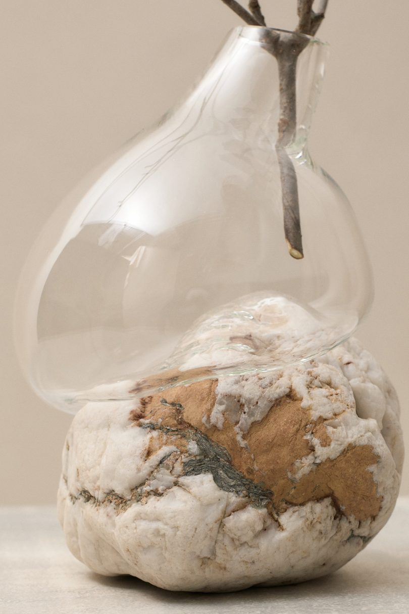 closeup glass vessel and rock
