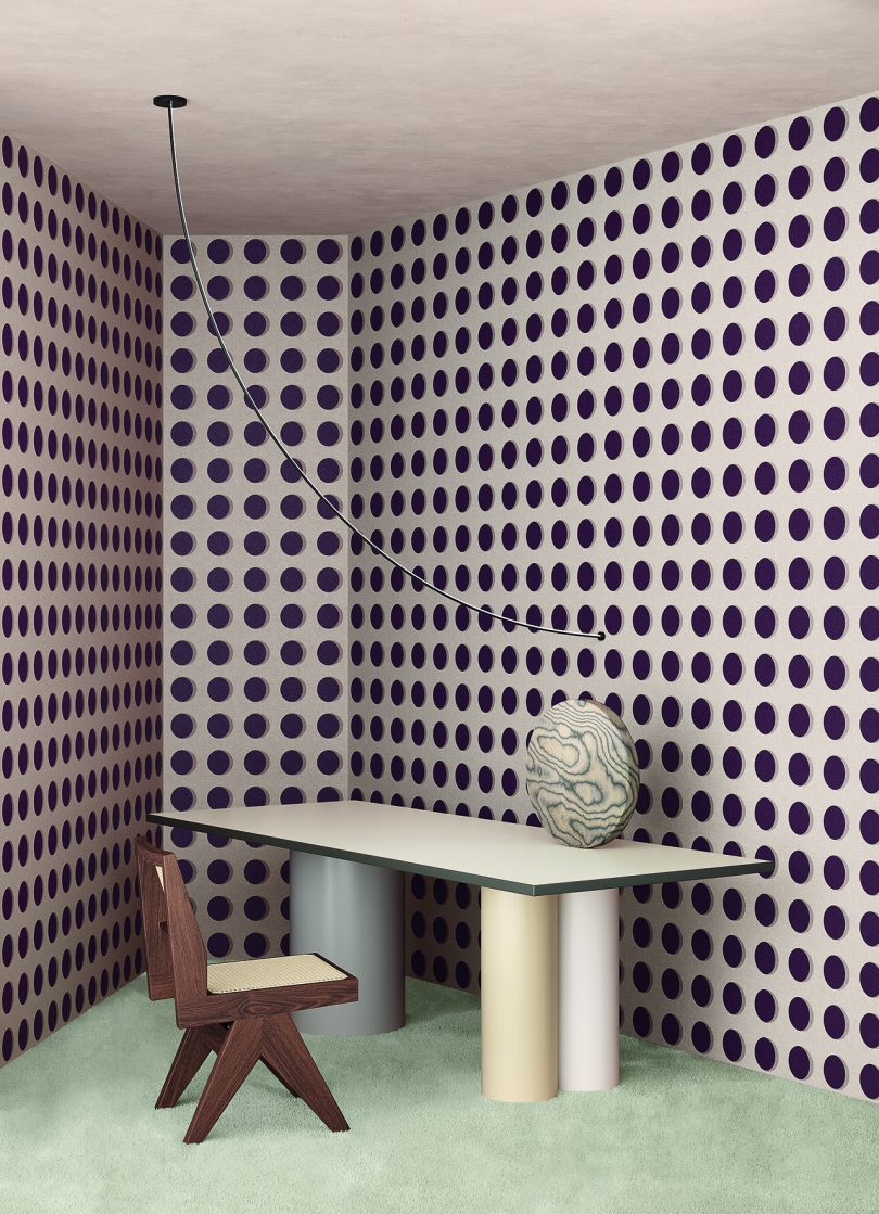 room with bold geometric wallpaper