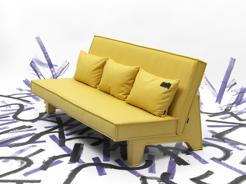 yellow three seat sofa