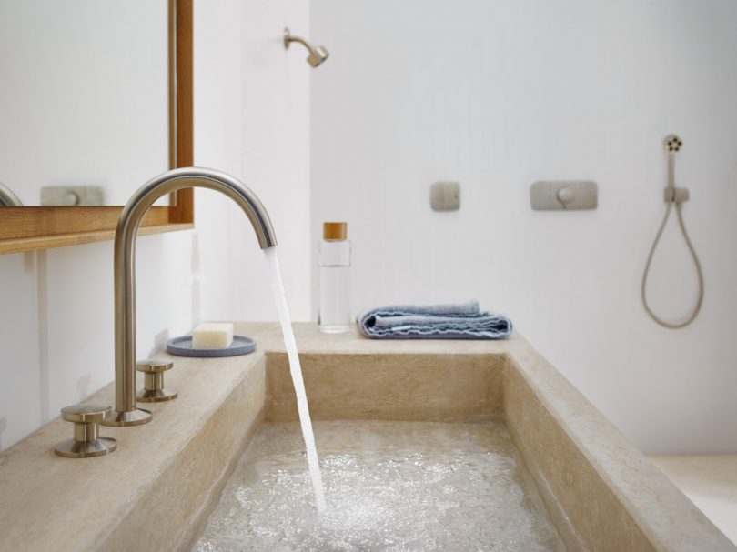 bathroom sink with water running