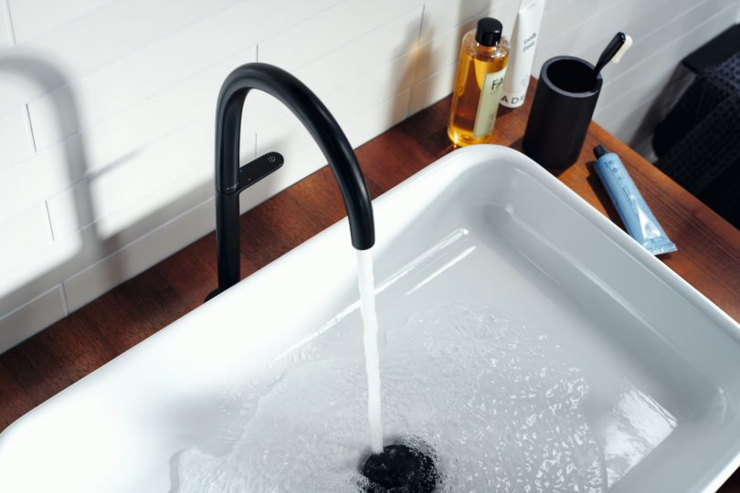 bathroom sink with water running