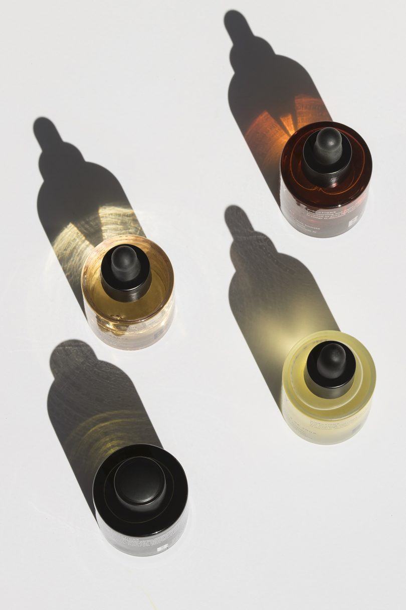 four bottles of face oil