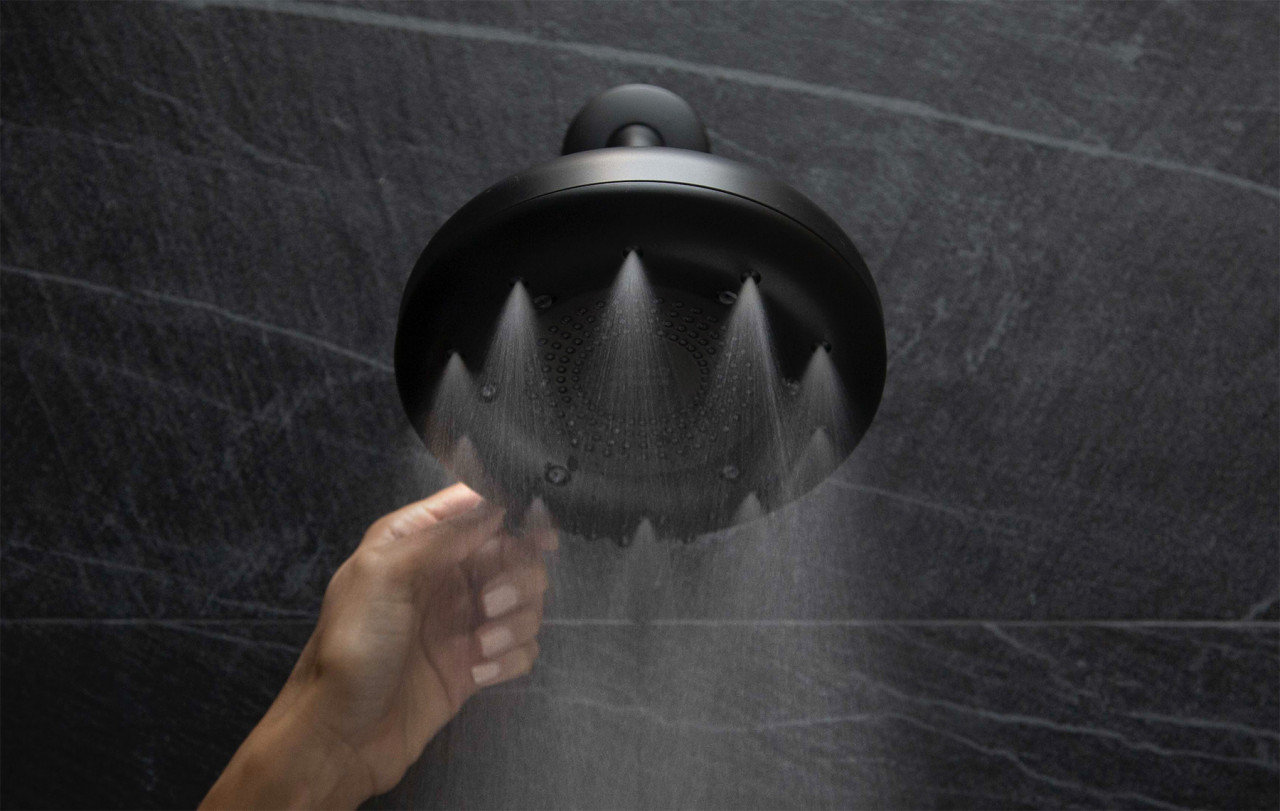 Showering Under the Nebia by Moen Quattro Saves up to 50% Water