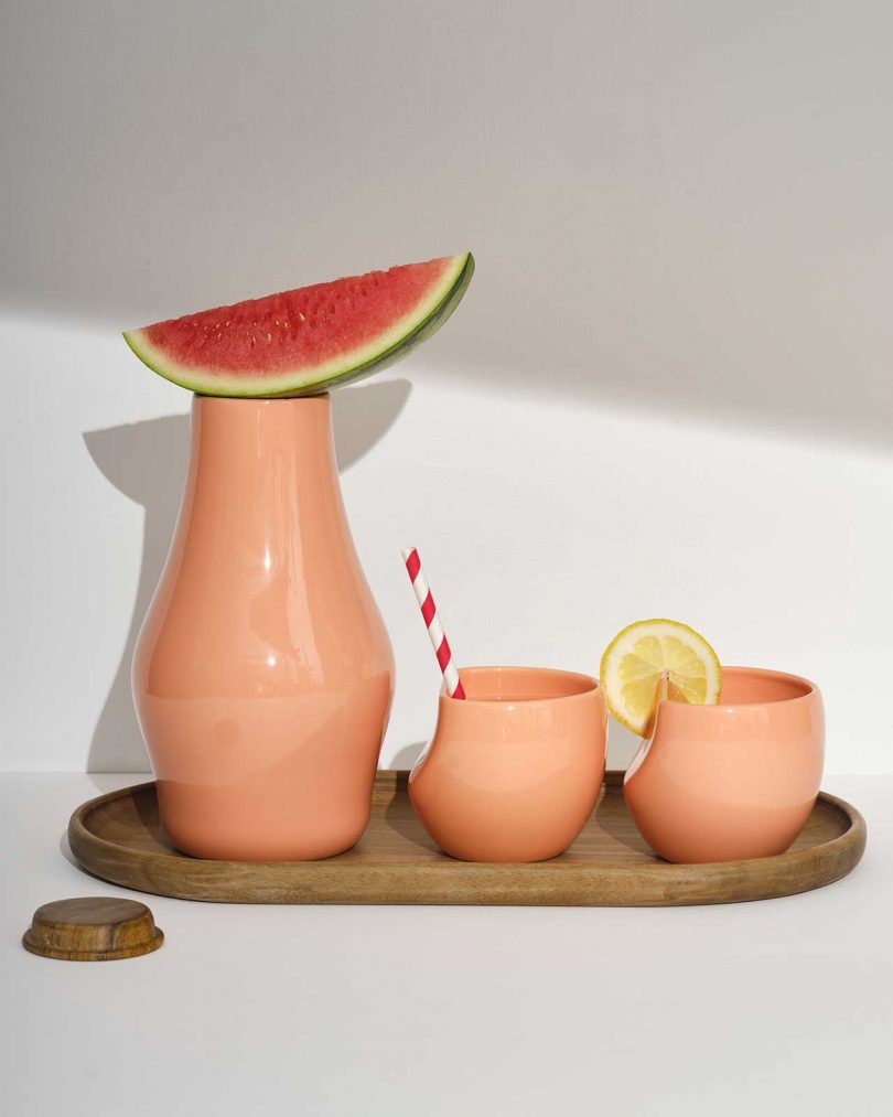 peach colored carafe with peach cups