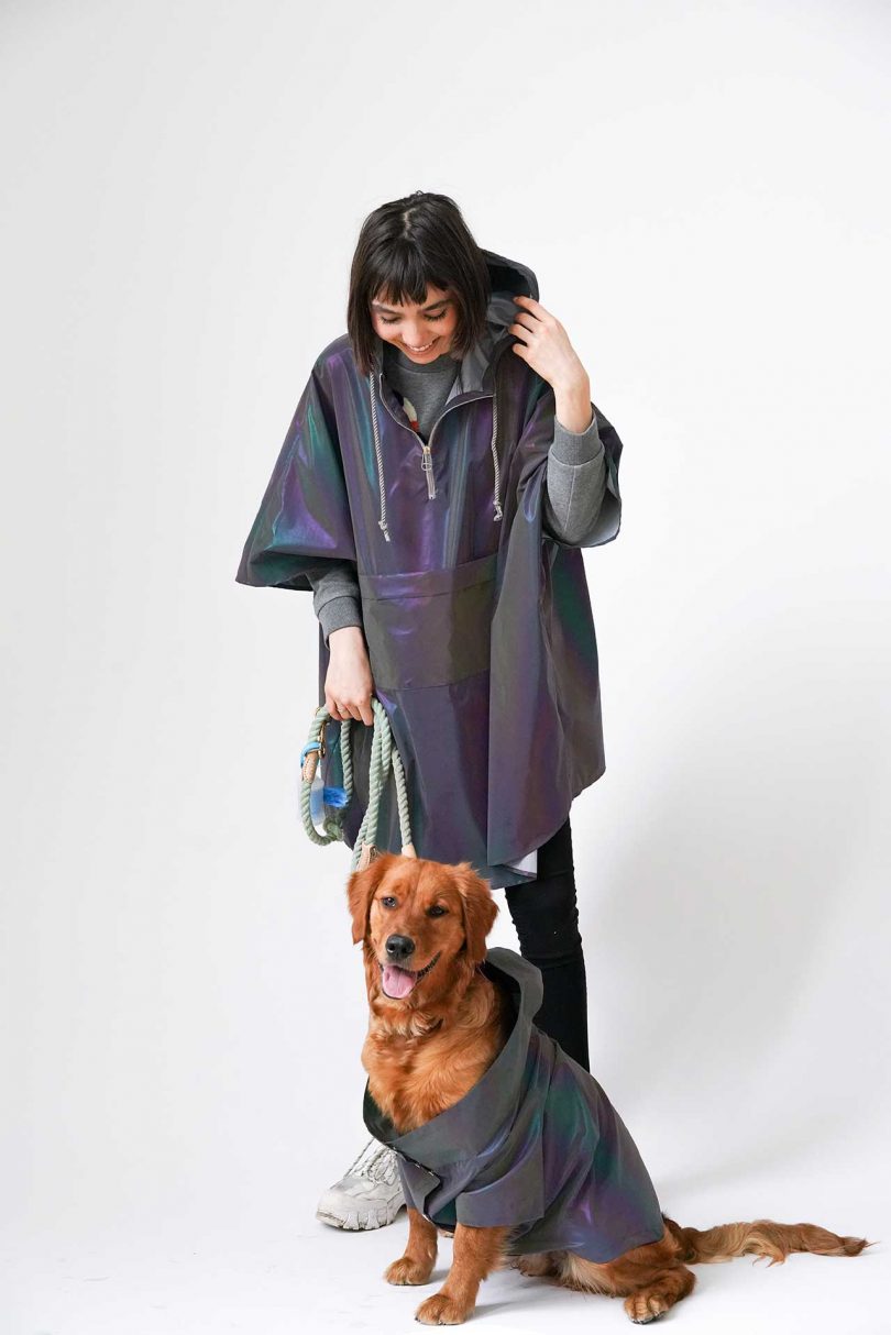 person and dog in matching raincoats