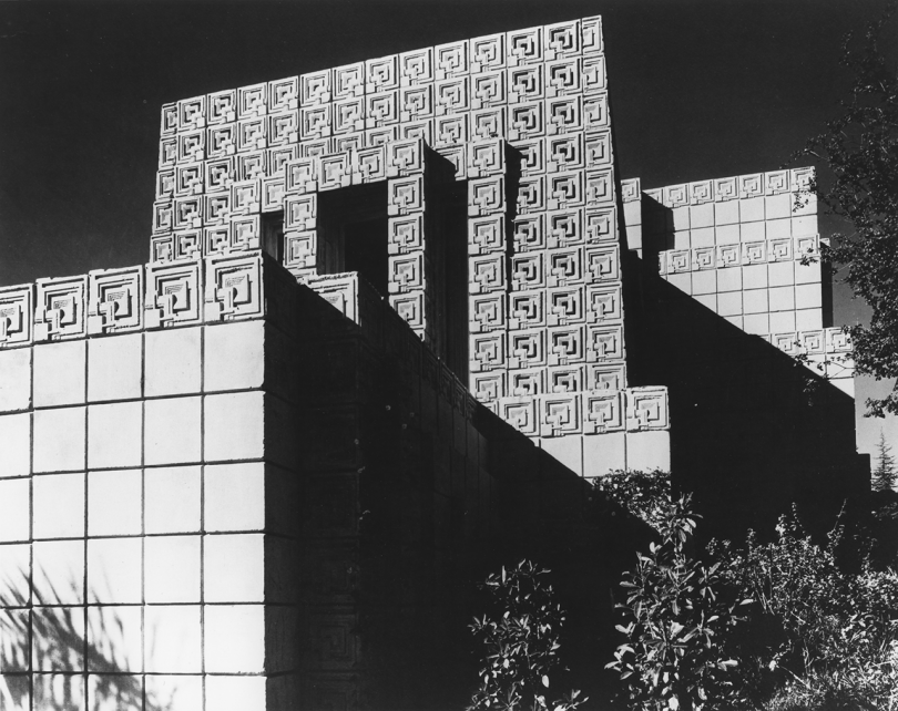 black and white photo of cement tile building