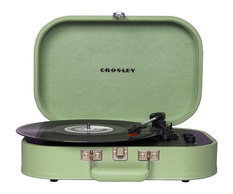 light green record player case on white background
