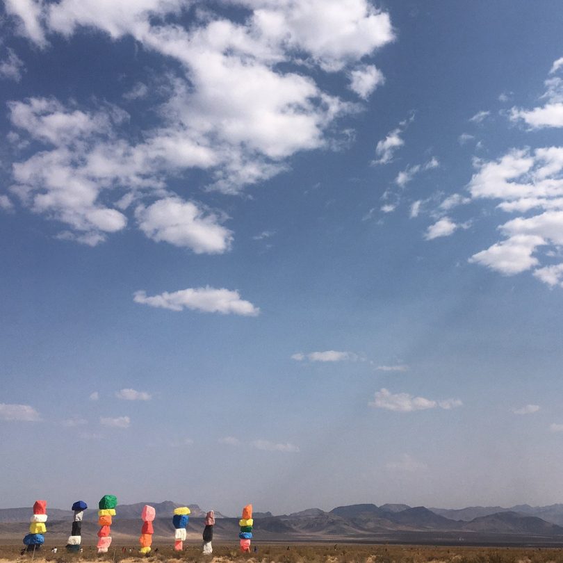 Seven Magic Mountains art installation under a big blue sky