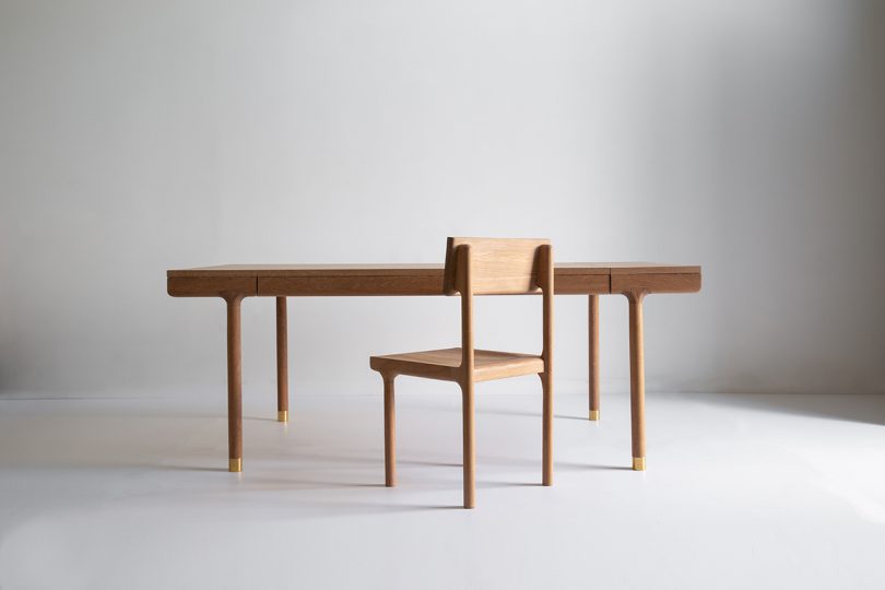 Oak dining chair and desk in light room