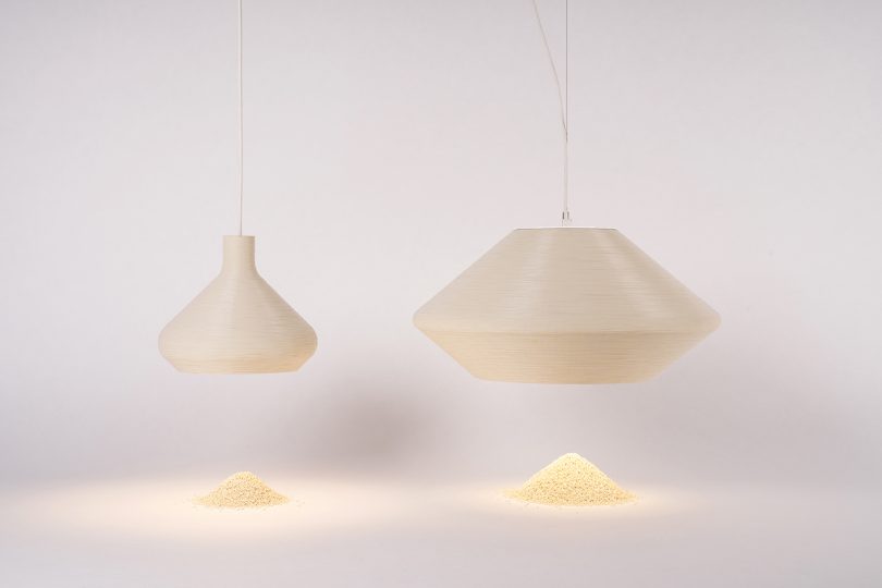 two hanging white pendant lights