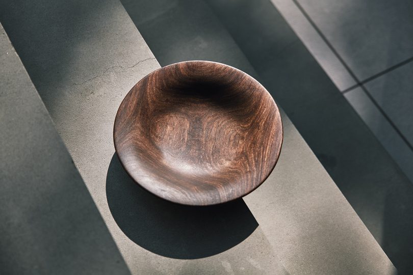 wooden bowl sitting on ledge