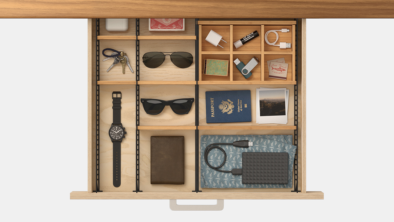 overhead photo of adjustable drawer organizer with dresser accessories