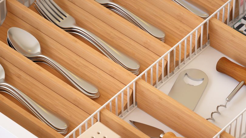 adjustable drawer organizer with kitchen utensils